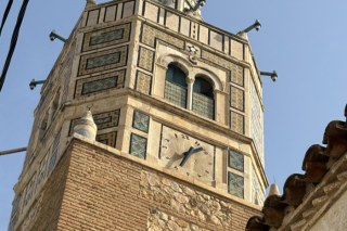Minaret with anticlockwise clock in Testour TN